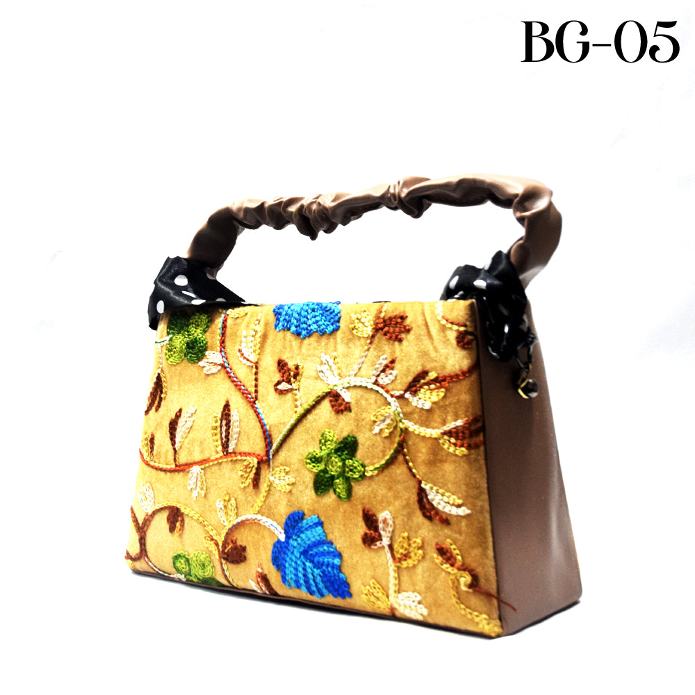 Decorative handbag with floral patterns on a white background
