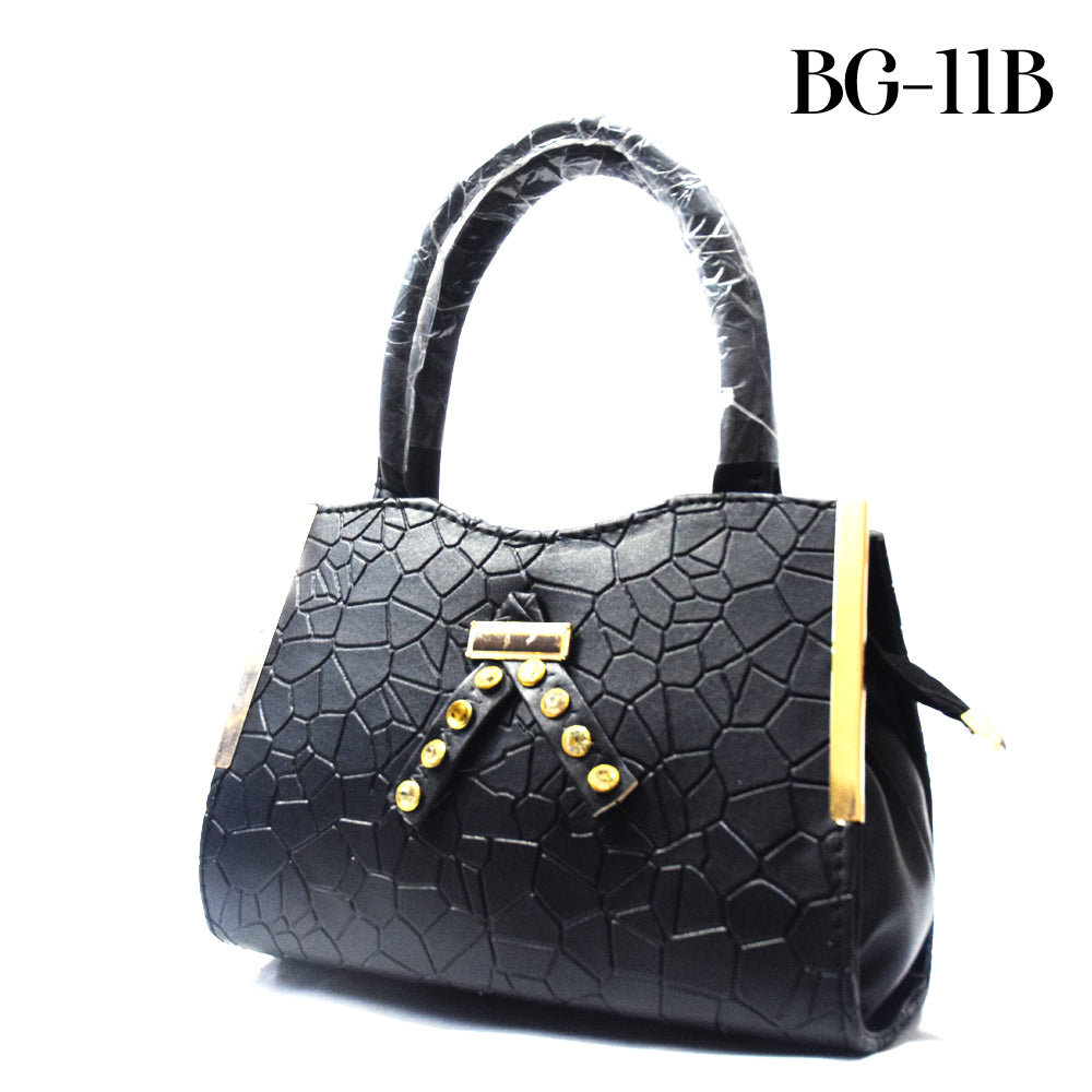 Black textured handbag with gold accents on a white background