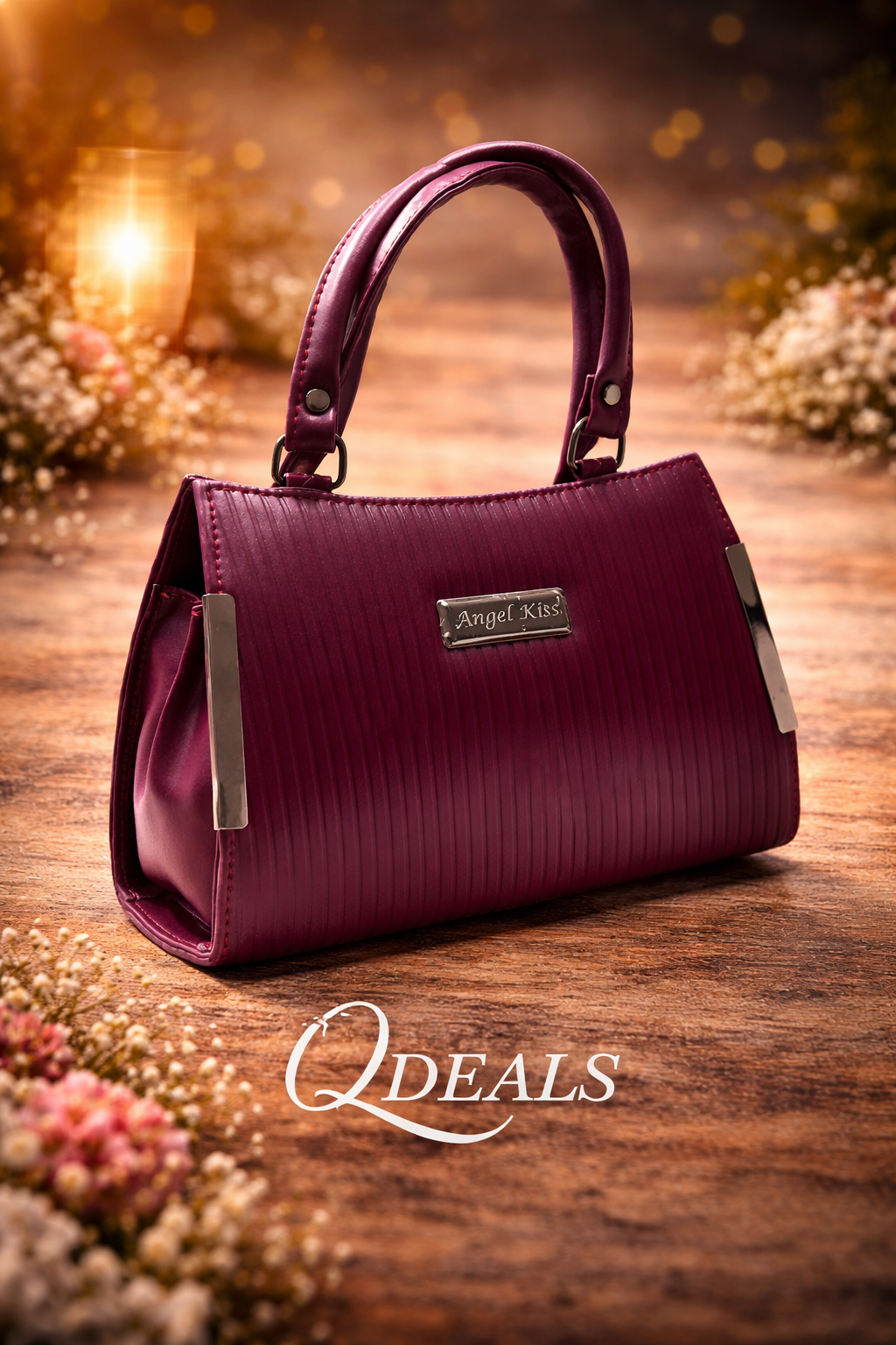 Purple handbag with 'Angel Kiss' label on a wooden surface, surrounded by flowers.