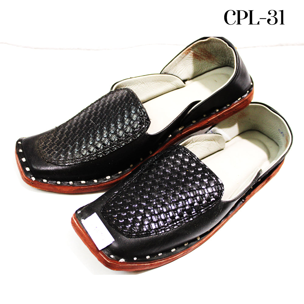 Black leather loafers with white lining on a white background