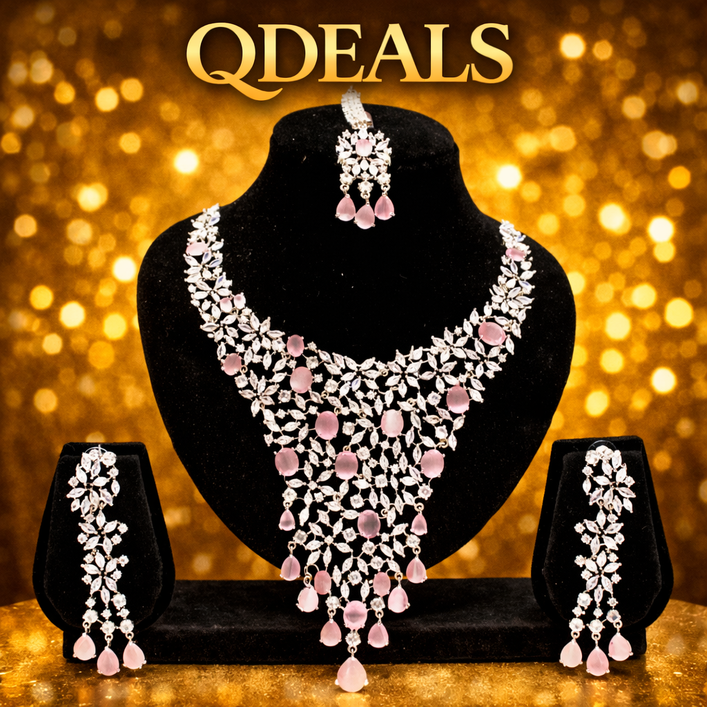 Jewelry set with necklace and earrings on a black stand against a gold bokeh background, branded 'QDEALS'.