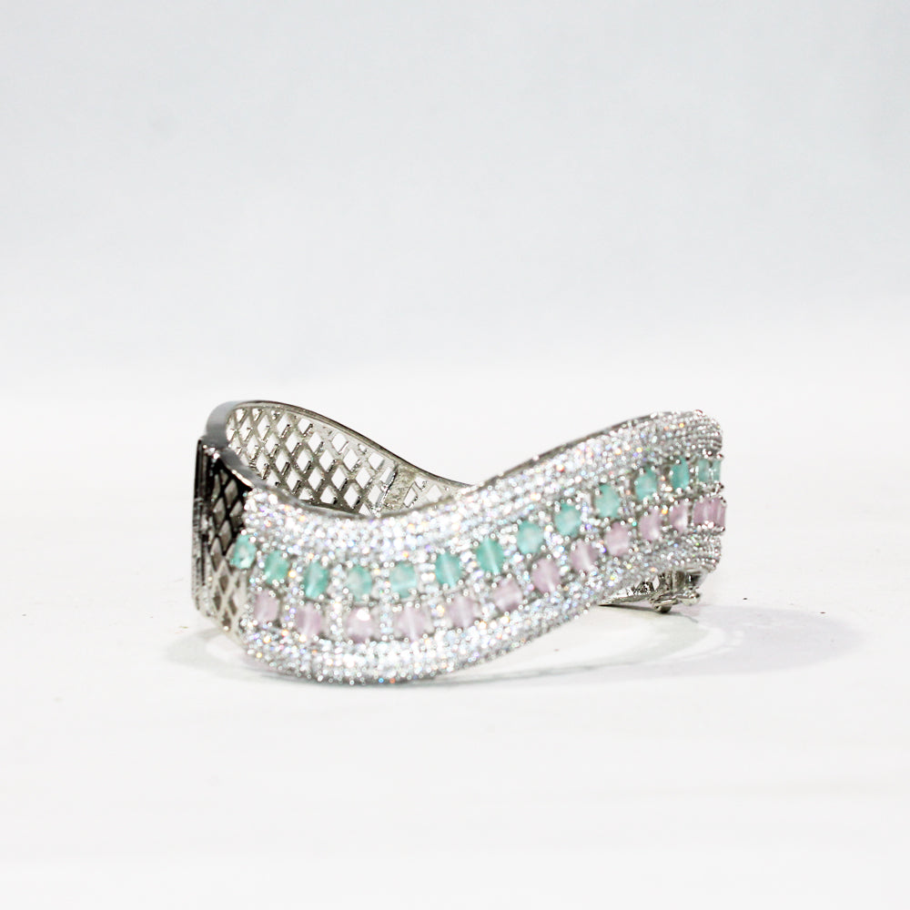 Silver ring with gemstones on a white background